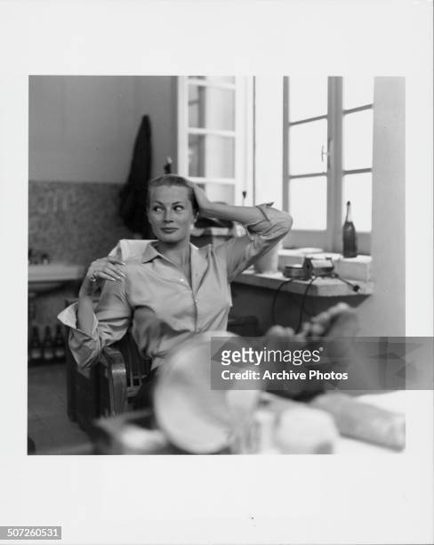 Portrait of actress Anita Ekberg sitting in a make-up chair, circa 1955.