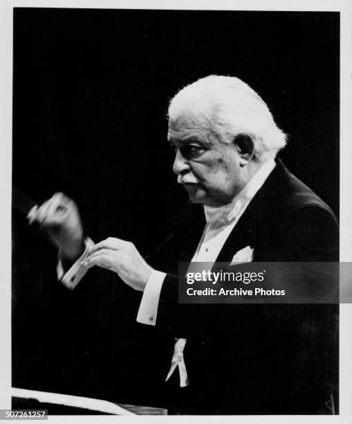 Portrait of conductor Arthur Fiedler, conducting wearing white tie, circa 1955.