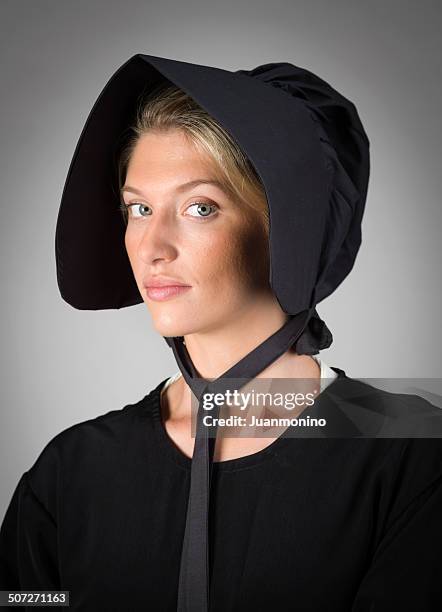 real amish mennonite young woman - amish women stock pictures, royalty-free photos & images