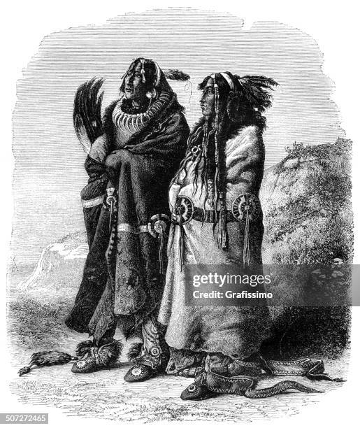 native american from the mandan tribe 1870 - comanche tribes stock illustrations