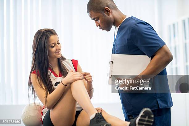 volleyball player showing her injury - ssc exam stock pictures, royalty-free photos & images
