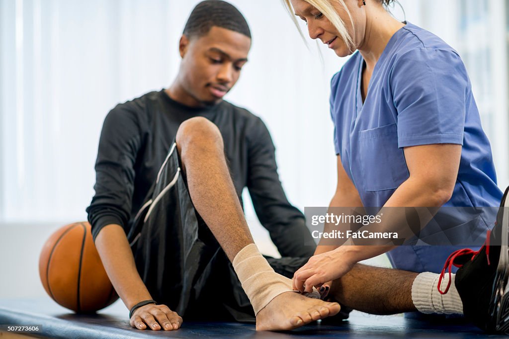 Baksetball Player Getting Bandaged Up