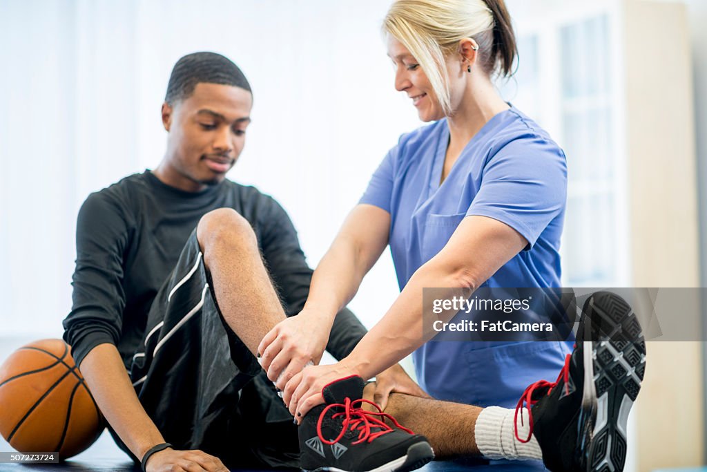 Basketball Player Getting Physical Therapy