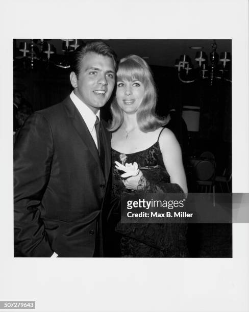Actor and singer Fabian Forte, with his fiancee Katy Regan, attending the Nancy Ames opening at Century Plaza, Los Angeles, CA, 1966.