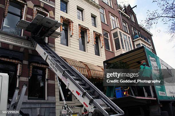 netherlands: movers in amsterdam - hiss bildbanksfoton och bilder