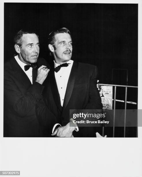 Actors Henry Fonda and George Peppard atending the premier of the movie 'Breakfast at Tiffany's', at Gruman's Chinese Theatre, Hollywood, CA, October...