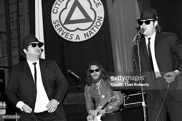 Dan Aykroyd and John Belushi with Steve Cropper in back performing with The Blues Brothers at the Palladium in New York City on June 1, 1980.