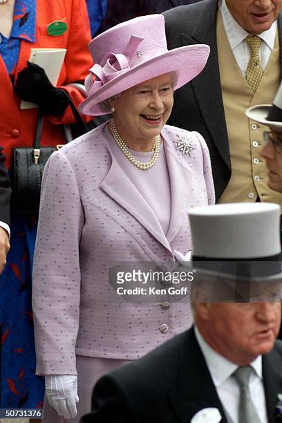England's Queen Elizabeth arriving in the royal enclosure on the fourth and final day of the Royal Ascot meeting.
