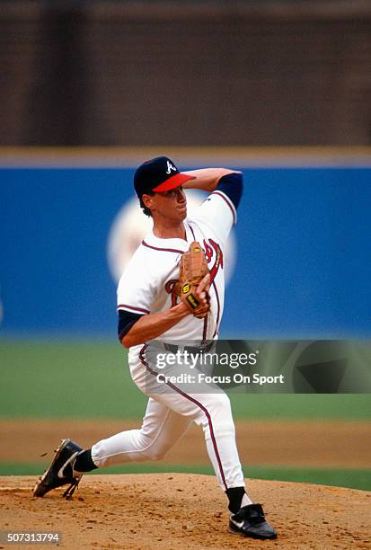 Tom Glavine of the Atlanta Braves pitches during a Major League Baseball game circa 1990 at Atlanta-Fulton County Stadium in Atlanta, Georgia....