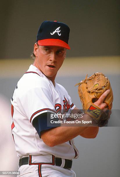 Tom Glavine of the Atlanta Braves pitches during a Major League Baseball game circa 1990 at Atlanta-Fulton County Stadium in Atlanta, Georgia....