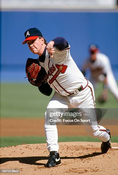 Tom Glavine of the Atlanta Braves pitches during a Major League Baseball game circa 1995 at Atlanta-Fulton County Stadium in Atlanta, Georgia....