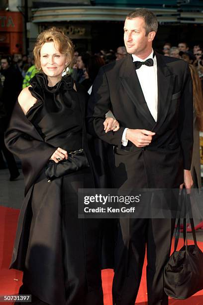 Actress Faye Dunaway w. Unident. At the Bafta Awards, the British Oscars, at the Odeon Leicester Square.