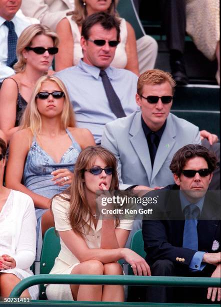 Golfer Nick Faldo , tennis player Anna Kournikova and her boyfriend ice hockey professional Sergei Fedorov, film star Elizabeth Hurley and friend...