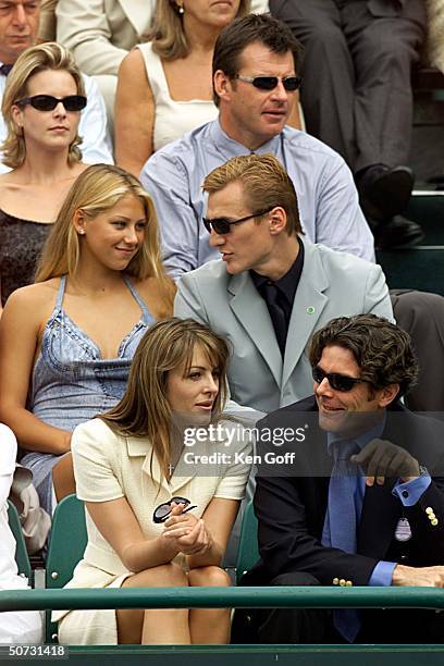 Golfer Nick Faldo , tennis player Anna Kournikova and boyfriend ice hockey professional Sergei Federov, film star Liz Hurley and friend watching...