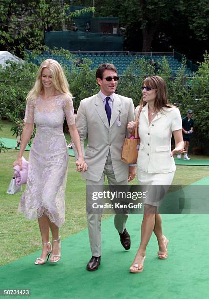 Model Claudia Schiffer & husband-to-be Tim Jeffries, with actress Elizabeth Hurley at charity tennis event at Buckingham Palace for the National...