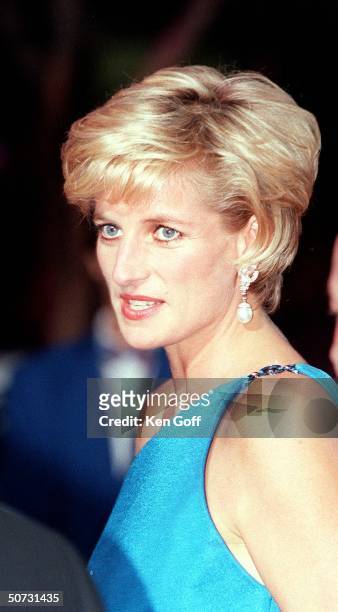 England's Princess Diana in blue one-shouldered gown at Gala evening on the first night of her visit to Australia.