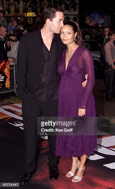 Actress Thandie Newton & husband Oliver Parker at UK Gala Premiere of the movie Mission Impossible 2 at the Empire, Leicester Square.