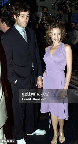 Actress Kylie Minogue and boyfriend at the premiere of the movie Mission Impossible 2 at the Empire, Leicester Square.