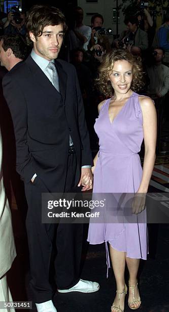 Actress Kylie Minogue and boyfriend at the premiere of the movie Mission Impossible 2 at the Empire, Leicester Square.