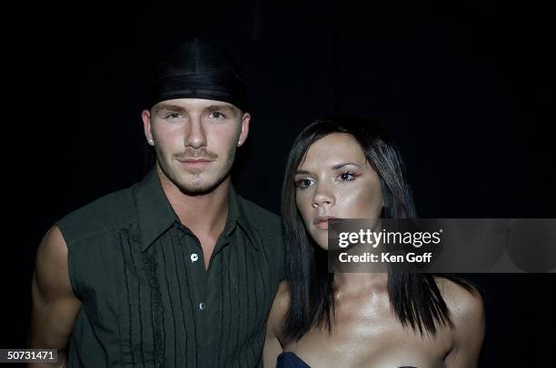 Singer Victoria ``Posh Spice'' Adams and her soccer star husband David Beckham at Party in the Park 2000.