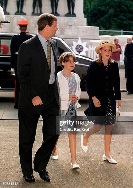 Britain's Prince Andrew w. Daughters Princess Eugenie and Princess Beatrice arriving at pageant honoring the 100th birthday of Queen Elizabeth....