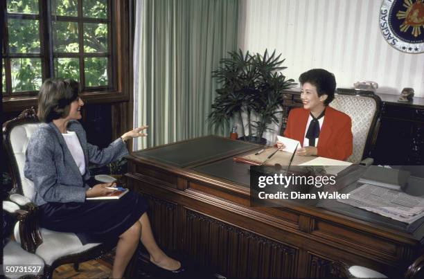 Correspondent Sandra Burton interviewing Philippine leader Corazon Aquino.