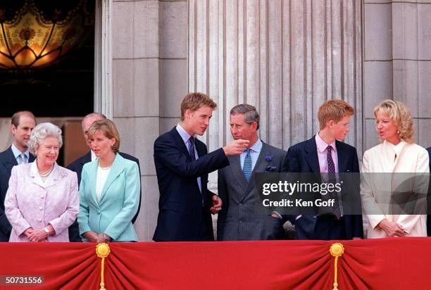 Queen Elizabeth II in lavender, Sophie, Countess of Wessex in green, Prince William, Prince Charles, Prince Harry, and Princess Michael of Kent in...