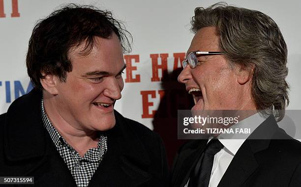 Director Quentin Tarantino and US actor Kurt Russell share a laugh during the premiere of the film 'The Hateful Eight' in Rome on January 28, 2016. /...