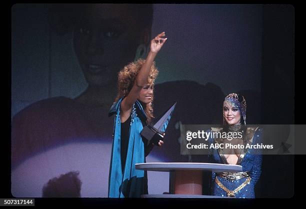 Show Coverage - Airdate: January 27, 1986. WHITNEY HOUSTON , FAVORITE SOUL/R&B SINGLE FOR "YOU GIVE GOOD LOVE" WITH PRESENTER APOLLONIA KOTERO