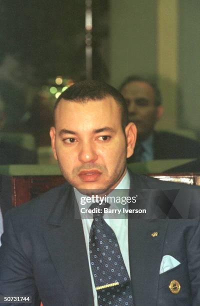 Moroccan King Mohammed VI in serious portrait during Arab League summit held October 21-22.