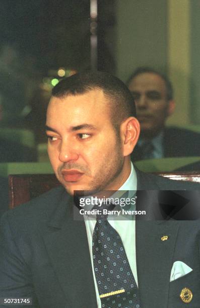 Moroccan King Mohammed VI in serious portrait during Arab League summit held October 21-22.