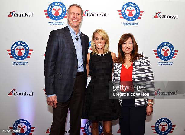 Operation Homefront President & CEO John Pray Jr., country superstar Carrie Underwood and Carnival Cruise Line President Christine Duffy pose for a...