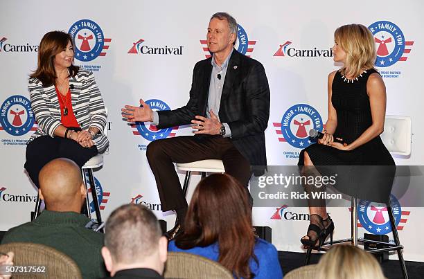 Carnival Cruise Line President Christine Duffy, left, and country superstar Carrie Underwood, right, listen to Operation Homefront President & CEO...