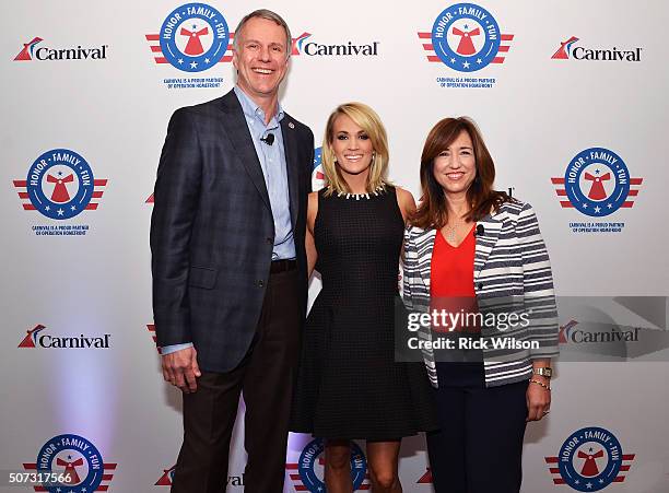 Operation Homefront President & CEO John Pray Jr., country superstar Carrie Underwood and Carnival Cruise Line President Christine Duffy pose for a...