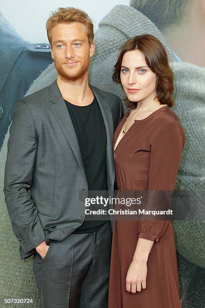 Alexander Fehling and Antje Traue attend the film premiere 'Der Fall Barschel' at Astor Film Lounge on January 28, 2016 in Berlin, Germany.