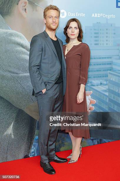 Alexander Fehling and Antje Traue attend the film premiere 'Der Fall Barschel' at Astor Film Lounge on January 28, 2016 in Berlin, Germany.