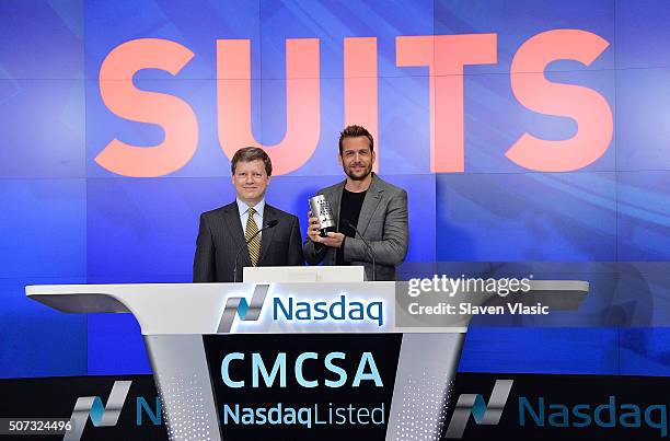 Senior Managing Director at Nasdaq Eric Bernbach and Gabriel Macht, star of "Suits" ring the Opening Bell at NASDAQ MarketSite on January 28, 2016 in...