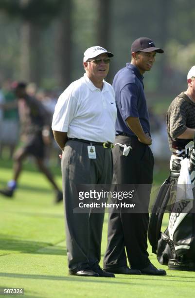 Tiger Woods and his coach Butch Harmon during a practice round prior to the start of the 2001 PGA Championship at the Atlanta Athletic Club in...