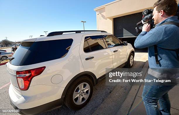 Ethan Couch, in this white SUV, returns to North Texas to the Scott D. Moore Juvenile Justice Center on Jan. 28, 2016 in Fort Worth, Texas.