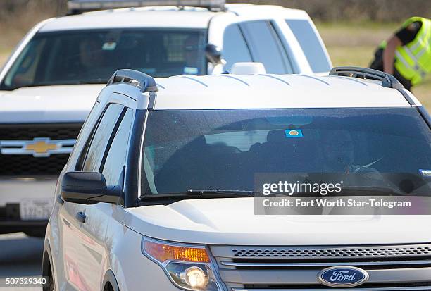 Ethan Couch, in this white SUV, returns to North Texas to the Scott D. Moore Juvenile Justice Center on Jan. 28, 2016 in Fort Worth, Texas.