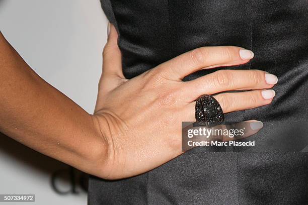 Tulin Sahin, ring detail, attends the 'De Grisogono' La Boetie cocktail on January 28, 2016 in Paris, France.