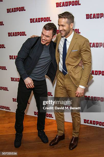 Ed Skrein and Ryan Reynolds attend a fan screening of "Deadpool" at The Soho Hotel on January 28, 2016 in London, England.