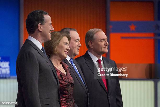 Republican presidential candidates Rick Santorum, former senator from Pennsylvania, from left, Carly Fiorina, former chairman and chief executive...
