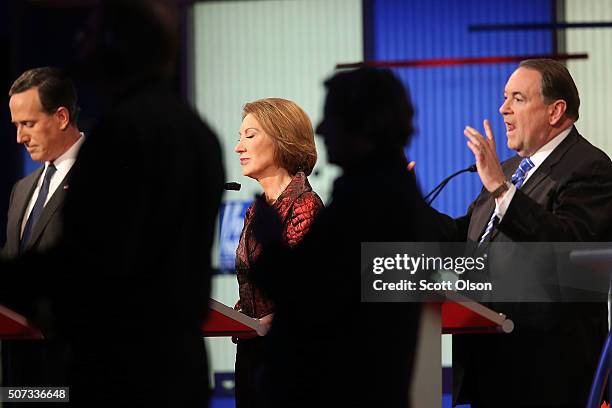 Republican presidential candidates Rick Santorum, Carly Fiorina and Mike Huckabee participate in the Fox News - Google GOP Debate January 28, 2016 at...