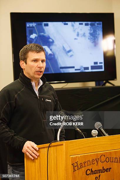 Special agent Greg Bretzing addresses the public at the Harney County Chamber of Commerce meeting in Burns, Oregon on January 28, 2016. Behind him is...
