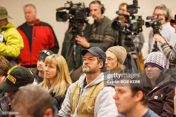 Members of the community and the media lissten as FBI special agent Greg Bretzing speaks at the Harney County Chamber of Commerce meeting in Burns,...