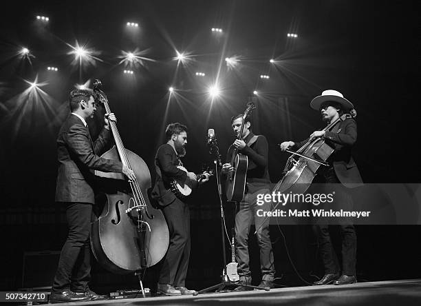 Bob Crawford, Scott Avett, Seth Avett, and Joe Kwon of The Avett Brothers perform onstage during the "American Epic" Premiere during the 2016...