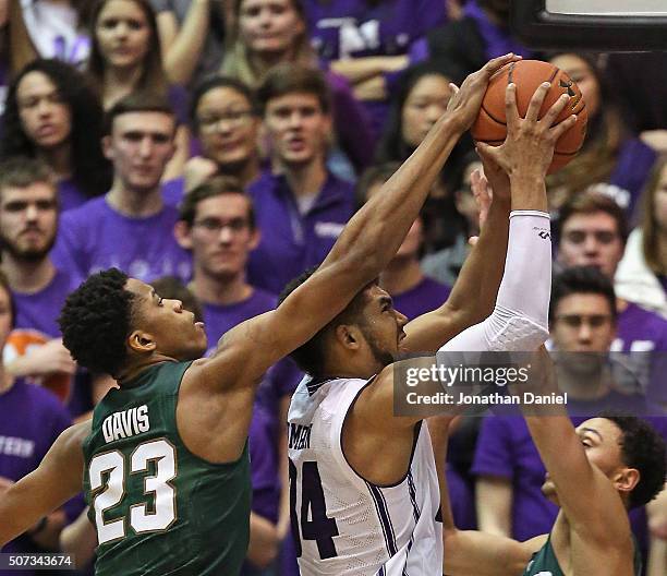 Deyonta Davis of the Michigan State Spartans blocks a shot by Sanjay Lumpkin of the Northwestern Wildcats at Welsh-Ryan Arena on January 28, 2016 in...