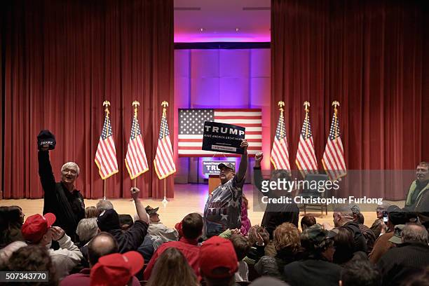 Veterans chant "Trump" as they wait for Republican presidential candidate Donald Trump to address them at Drake University on January 28, 2016 in Des...