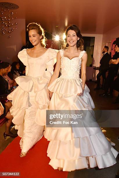 Couple' of models walk the Runway during the Jean Doucet 'Bonheur Pour Tous' Gay and Lesbian Wedding dresses show as part of Paris Fashion Week on...